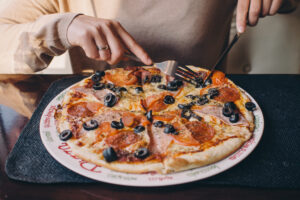 pizza eating in restaurant